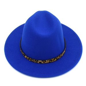 Top view of bright blue felt fedora hat featuring a stylish leopard print decorative band