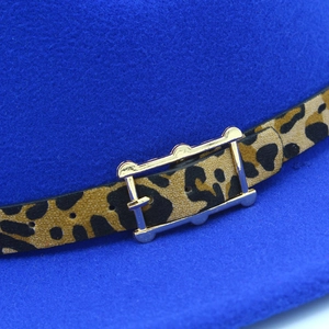 Blue felt jazz hat featuring a stylish leopard print band with a gold metal buckle