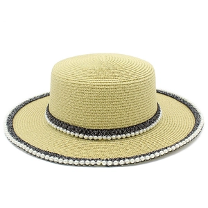 Elegant wide-brim straw sun hat for women with black pearl-embellished ribbon trim