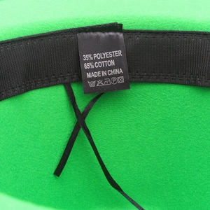 Detail view of cotton-polyester fedora inner lining with sweatband and care label
