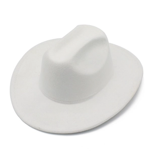 Close-up of white felt fedora hat showing crown indent and fine stitched brim edge