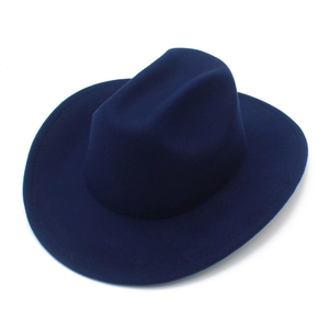 Top view of a navy blue wool felt cowboy hat with a wide brim and classic indented crown