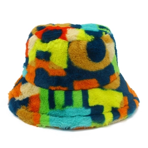 Detail of colorful faux fur bucket hat with soft plush texture and patchwork pattern