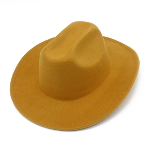 Mustard yellow wide brim fedora hat with a classic dented top and stitching details