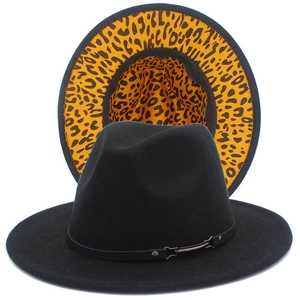 Detail view of black wool fedora showing stylish leopard print lining and leather belt buckle