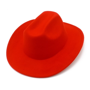 Classic bright red western cowboy hat with curved brim made of warm wool felt material