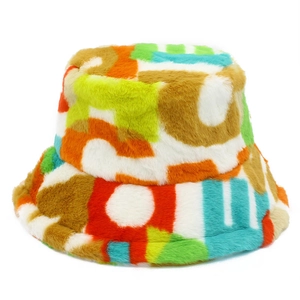 Colorful plush faux fur bucket hat with vibrant abstract geometric pattern for winter warmth