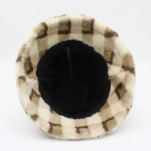 Detail showing the adjustable drawstring and soft black lining of the plaid bucket hat