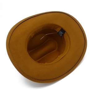 Interior view of tan felt fedora hat featuring a black sweatband and material label