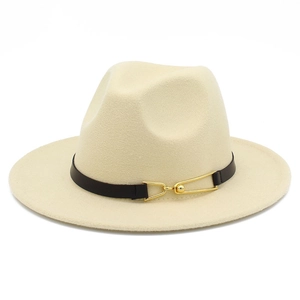 Detail of cream wool fedora hat featuring dark brown leather band and gold buckle