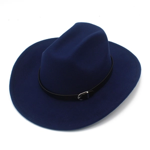 Detailed macro view of the navy blue felt fedora hat with elegant black leather buckle belt