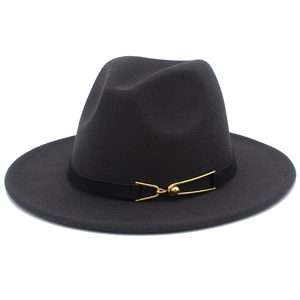 Detail of dark grey wool fedora hat featuring a black leather band and gold metal buckle