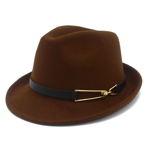 Detail of dark brown wool fedora hat featuring a black leather band and gold buckle