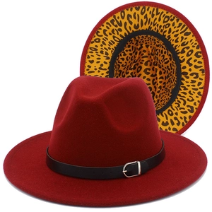Detail of burgundy wool fedora showing the stylish leopard print lining and leather belt trim