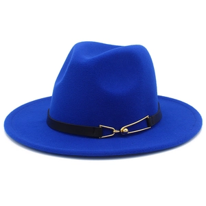 Close-up of royal blue wool fedora hat with black leather strap and gold metal buckle