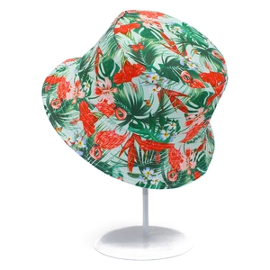 Tropical flamingo and palm leaf print bucket hat for sun protection and outdoor travel