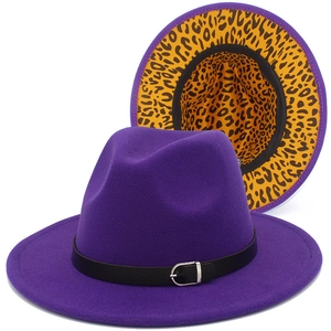 Detailed view of purple wool fedora with black belt buckle and leopard print lining detail