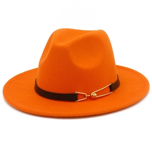 Close-up of bright orange wool fedora featuring a black leather belt and gold metal buckle
