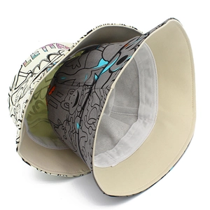 Double-sided cotton bucket hats with gray frog pattern and cream graffiti prints