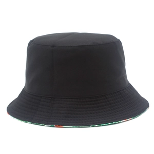 Classic black cotton bucket hat with tropical floral print lining on white background