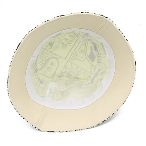Detail of cotton bucket hat featuring breathable white mesh lining and graffiti pattern