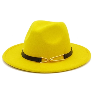 Detail of a bright yellow fedora hat featuring a black leather belt with a gold buckle