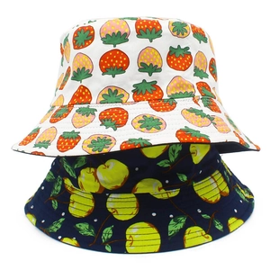 Double-sided cotton bucket hats featuring strawberry and fruit patterns on white and navy