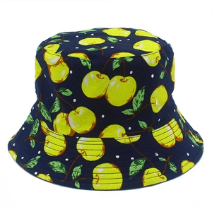 Reversible cotton bucket hat with yellow strawberry fruit print on deep blue fabric