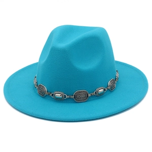Detailed view of the teal wool fedora hat featuring an ethnic style metal chain band