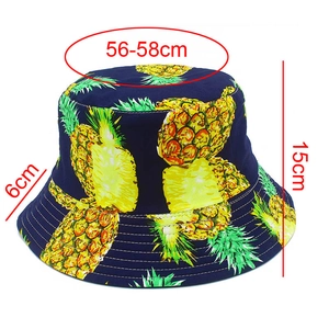 Detailed size chart for cotton bucket hat with yellow pineapple pattern in dark blue
