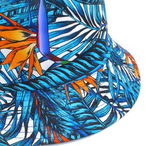 Detail shot of tropical floral print and stitching on cotton reversible bucket hat