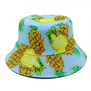 Light blue cotton sun bucket hat with yellow pineapple pattern for outdoor travel
