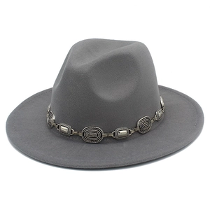 Detail showing the gray wool fedora hat with a vintage silver metal decorative chain band