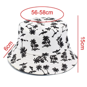 Detailed size specifications for white cotton bucket hat with black palm tree patterns