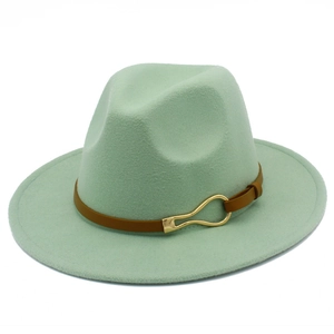 Close-up of mint green wide brim fedora hat featuring a brown belt with gold metal buckle