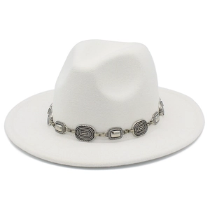 Detailed view of white wool fedora hat featuring an ornate vintage silver metal band