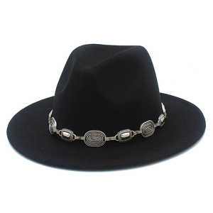 Close-up of black wool fedora featuring a decorative silver metallic link chain band