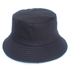 Detailed view of black cotton bucket hat with parallel stitching and floral lining