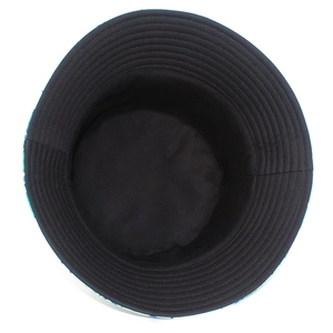 Detail of cotton sun hat interior with reinforced stitching and floral pattern brim