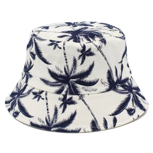 Bob en coton avec imprimé palmier bleu marine sur fond écru pour protection solaire