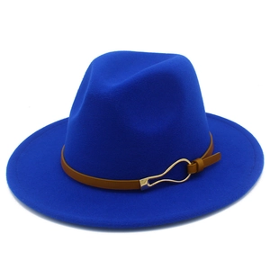 Detail of bright blue wool fedora hat with brown leather band and gold metal buckle