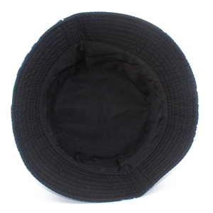 Detail view of the black fabric lining and reinforced stitching on the bucket hat interior