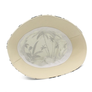 Détail intérieur du chapeau de soleil en coton avec doublure beige et motifs de cocotiers