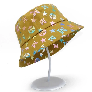 Mustard yellow cotton bucket hat with laser holographic alphabet and star printing