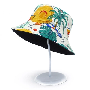 Reversible cotton Panama sun hat with colorful tropical prints and black lining