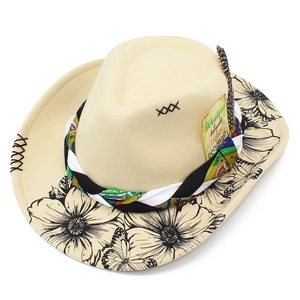 Detail of beige felt cowboy hat with floral print brim and ethnic woven band with feather
