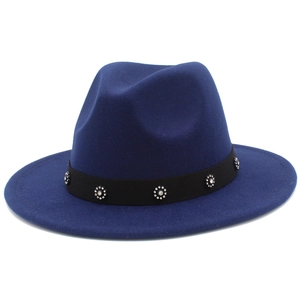 Detailed close-up of navy wool fedora hat with floral rhinestone-studded black ribbon band