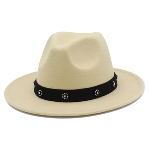 Detailed macro view of the beige wool fedora hat featuring a sparkling rhinestone flower band