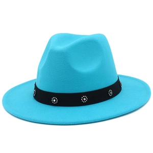 Detail of sky blue wool fedora hat with black band and sparkling rhinestone flowers
