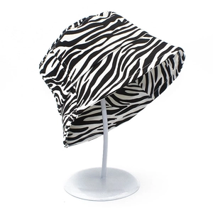 Detail of cotton zebra print bucket hat showing fabric texture and wide brim structure